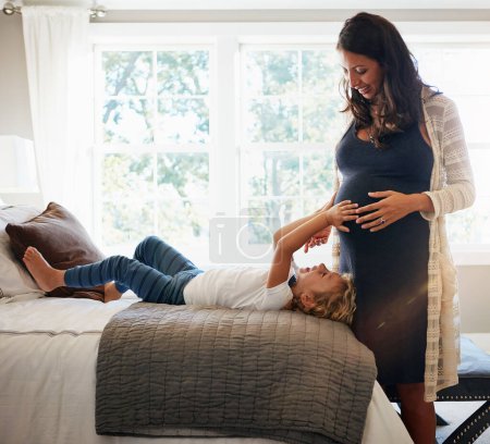 Photo for Home bed, pregnant woman and child touch stomach, abdomen and happiness for moving baby check. Expectation, maternity and kid check life growth, pregnancy or belly of mother, mom or mama in bedroom. - Royalty Free Image