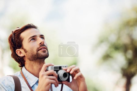 Photo for Photographer, camera or man on holiday, vacation or trip for a fun summer adventure in Italy looking up. Bokeh mockup space, tourist or person with sightseeing in nature journey or park for travel. - Royalty Free Image