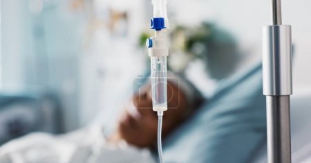 Photo for Iv drip, patient and medicine in hospital for healthcare, nutrition or water in bed with healing. Medical, liquid and person with health support or solution for emergency, wellness or rehabilitation. - Royalty Free Image