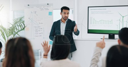Photo for Businessman, presentation and coaching with questions in meeting, conference or idea at office. Asian man or mentor talking to audience or business people with hand raised for interaction at workshop. - Royalty Free Image