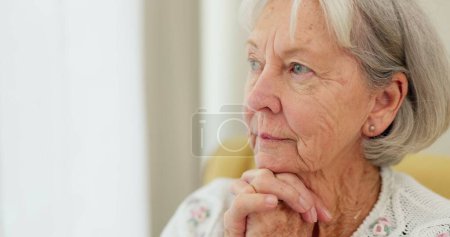 Photo for Thinking, anxiety and senior woman with fear, stress or Alzheimer, grief or trauma memory in her home. Stress, memory loss and elderly lady widow with doubt, dementia or depression, sad or mourning. - Royalty Free Image