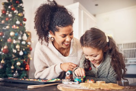 Photo for Baker, kid and mother on christmas with smile or teaching to make food in kitchen for celebration. Happy child, parent and education with cookies in home for festive season with learning for cooking - Royalty Free Image