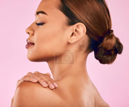 Photo for Face, profile and beauty, woman and skincare with natural cosmetics and shine isolated on pink background. Female model, health skin glow and dermatology with wellness, self love and makeup in studio. - Royalty Free Image