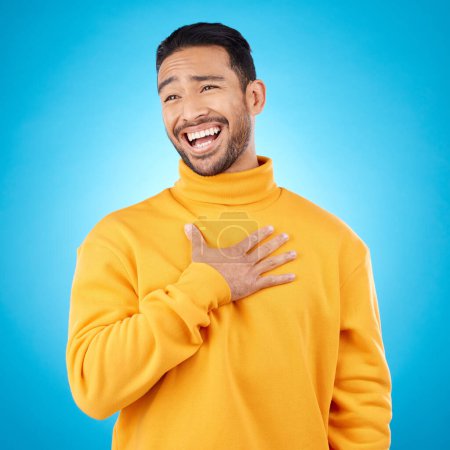 Photo for Young man, ego and pride in studio, with choice of me and comic laugh with trendy clothes by blue background. Funny gen z person, fashion model or happy student with smile after joke with self love. - Royalty Free Image