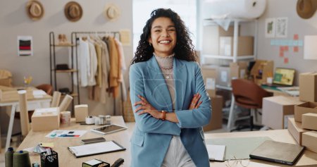 Photo for Businesswoman, confident and smile in office for logistics, warehouse or distribution startup in fashion. Portrait, female designer or happy with customer purchase for shipping, e commerce or retail. - Royalty Free Image