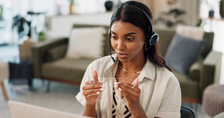 Woman, call center and headphones consulting in remote work, customer service or telemarketing at home office. Female person or consultant agent talking, explaining or online advice for help at house.