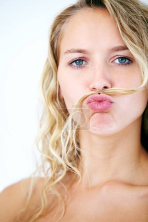 Photo for Woman, portrait and hair mustache for fun mood, scold finger or funny personality. Female person, face and humor kiss on white studio background for confident playful attitude, point or comedy joke. - Royalty Free Image
