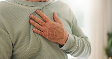 Photo for Heart attack, cardiology and person hand on chest with pain, sick and cardiovascular closeup. Indigestion, heartburn and health with wellness, elderly care with medical issue and hypertension. - Royalty Free Image