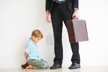 Photo for Man, work and child on floor with sad, love and care by businessman for fear, anxiety and tantrum. Father, tired and professional career in house to help, support and burnout kid in mental health. - Royalty Free Image