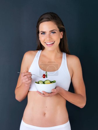 Photo for Salad, woman and diet portrait with fitness, health and nutrition of meal with a smile in studio. Workout, happy and female model with exercise and training with healthy food and vegetables for care. - Royalty Free Image