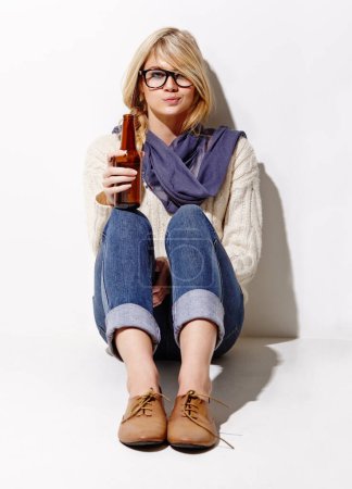 Photo for Portrait, beer and a bottle with a woman drinking in studio on a mockup white background. Party, event or alcohol with a young drunk girl enjoying a glass beverage for celebration or to relax. - Royalty Free Image
