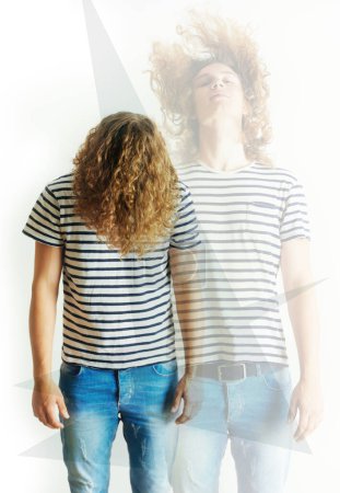 Photo for Fashion, double exposure or man with long hair with jeans, hipster clothes, punk style in studio. Creative overlay, edgy aesthetic or young male person with cool or stylish shirt on white background. - Royalty Free Image