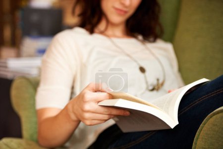 Photo for Reading, books and hands on sofa in library, bookstore or shop for research, learning and relax on couch. Literature, customer and person with book for education, information and knowledge for hobby. - Royalty Free Image