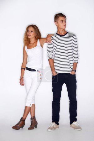 Photo for Fashion, couple of friends and clothes with style and people, trendy and stylish isolated on white background. Young, man and woman model in a studio with casual clothing, beauty and pose together. - Royalty Free Image