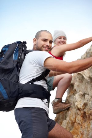 Photo for Couple in portrait, rock climbing and hiking adventure in mountain with nature, freedom or power. Travel, trekking and hanging, man and woman on cliff for natural outdoor journey together in fitness - Royalty Free Image