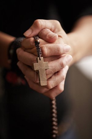 Photo for Hands, prayer with beads and worship for religion, trust and spiritual wellness with hope, peace and love. Support, mindfulness and person in Christian faith praying, gratitude and rosary with cross - Royalty Free Image