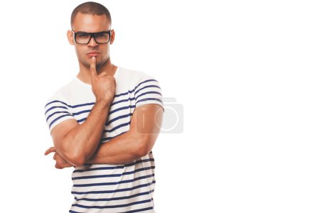 Photo for Man fashion model posing against a studio background. - Royalty Free Image