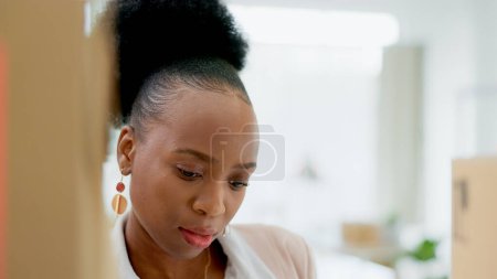 Photo for Thinking black woman, box and logistics in small business, inventory inspection or checking stock at retail store. Face of African female person in management for parcel, package or storage service. - Royalty Free Image