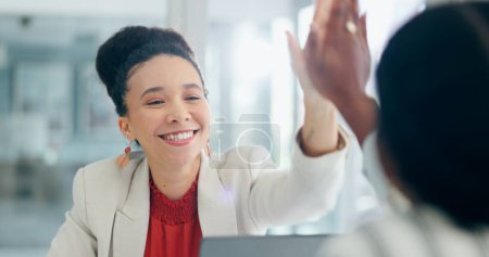 Photo for Business women, high five and happy in office with agreement, congratulations and work partnership. Employees, celebration and smile with respect, thank you and team building for goal in workplace. - Royalty Free Image