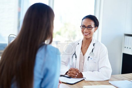 Photo for Active listening for a positive healthcare experience. a young doctor having a discussion with a patient in her consulting room - Royalty Free Image