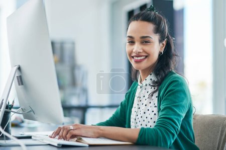 Photo for My new product is like nothing else on the market. Portrait of a young businesswoman using a computer in a modern office - Royalty Free Image
