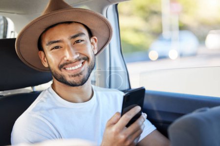 Photo for Look on every exit being an entrance somewhere else. a young man sitting in a car while using his phone - Royalty Free Image