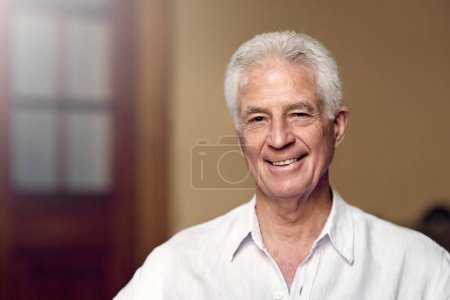 Photo for I created a life that made me happy. Portrait of a happy senior man at home - Royalty Free Image