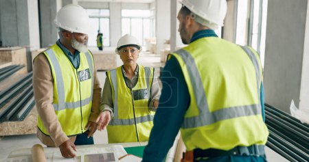 Photo for Meeting, discussion and team of construction workers in collaboration for building renovation. Industry, civil engineering and group of contractors talking for project development planning on site - Royalty Free Image