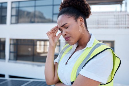Photo for Face, sad and woman in construction with headache at renovation site, civil engineering mistake and stress. Confused, tired and frustrated african contractor with burnout, crisis and problem in city. - Royalty Free Image