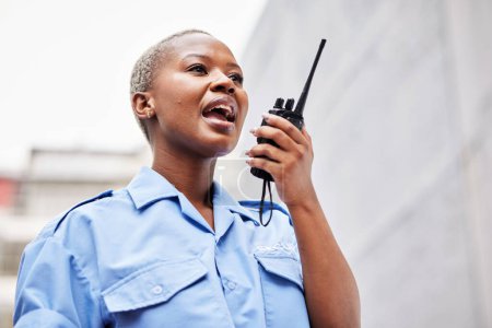 Photo for Walkie talkie, woman and security guard with radio outdoor for safety, justice and call backup. Black female police officer, bodyguard and contact audio communication for crime watch and surveillance. - Royalty Free Image