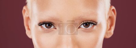 Photo for Portrait, woman eyes and beauty makeup with mascara and eyebrows bleached in a studio. Cosmetics, eyebrow treatment and self care for lashes close up of a young model with isolated brown background. - Royalty Free Image