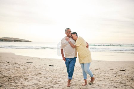 Photo for Senior couple hug, laughing and beach, ocean and travel with bonding and love, trust and marriage outdoor. Adventure, holiday and happiness, man and woman with comedy and life partner in nature. - Royalty Free Image