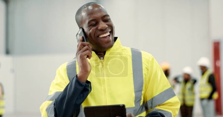 Photo for Happy black man, engineer and phone call laughing with tablet for funny joke, meme or discussion at warehouse. African male person, architect or contractor smile on mobile smartphone for conversation. - Royalty Free Image