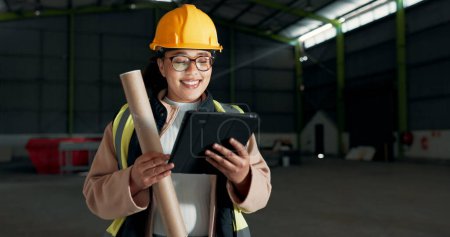 Photo for Architect, tablet and warehouse woman, happy engineer or construction worker smile for online design, maintenance or engineering. Industrial service, happiness and reading factory renovation feedback. - Royalty Free Image
