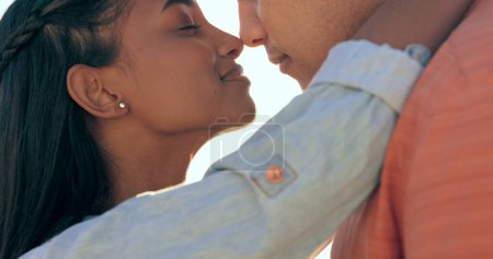 Photo for Couple, kiss and happy on holiday break with love, support and travel with marriage and vacation. Summer, adventure and calm outdoor with woman and man together with touch, hug and embrace with care. - Royalty Free Image