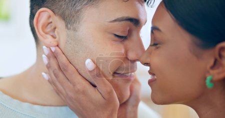 Photo for Happy, couple and eskimo kiss with hug and love for affection, bonding and romantic date at home. Peace, interracial and people with commitment, loyalty and respect in healthy relationship with calm. - Royalty Free Image