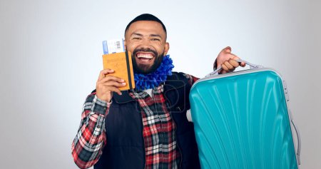 Photo for Happy man, suitcase and plane ticket for travel, excited about trip in portrait isolated on white background. Luggage, holiday and booking paperwork with passport and ready for adventure in studio. - Royalty Free Image