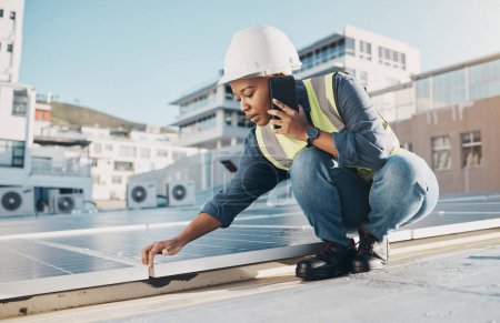 Photo for Black woman, rooftop solar panel or maintenance phone call about photovoltaic plate, sustainability or project. Eco friendly energy, cellphone conversation or female engineer talking about inspection. - Royalty Free Image