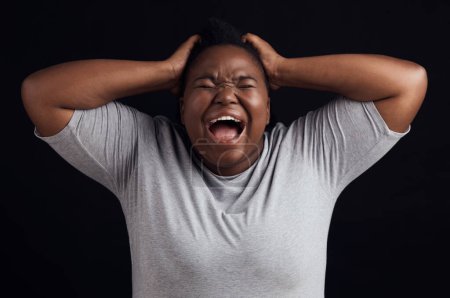 Photo for Anger, frustrated and black woman screaming, depression and mental health on a dark black studio background. Person, emotion and model shouting, anxiety and angry with grief, moody and lose control. - Royalty Free Image