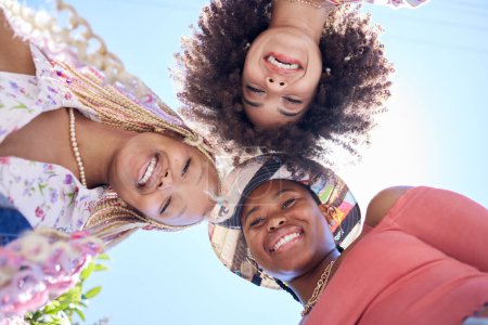 Photo for Black woman, blue sky and portrait of friends happy, smile and relax on San Francisco vacation for fun friendship reunion. Sunshine, travel and group of people or women on summer holiday below view. - Royalty Free Image