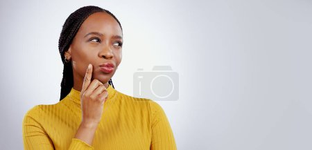 Photo for Woman, face and thinking in studio of ideas, mindfulness and solution for problem solving on white background. Black person, thoughtful and wondering for business or creative plan on mock up space. - Royalty Free Image