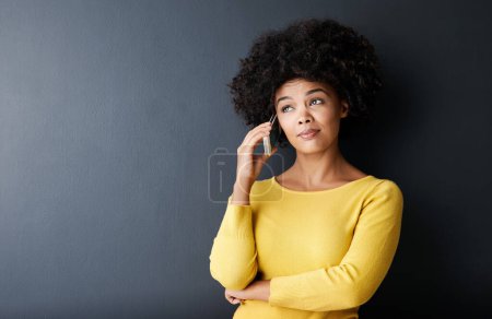 Photo for Black woman, thinking and phone call with questions, ideas, doubt emoji in studio background. African, face or person confused in conversation with drama, gossip or listening to contact communication. - Royalty Free Image