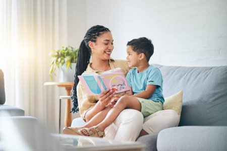 Photo for Book, love and mother with kid on sofa for storytelling in living room of happy home, teaching and bonding fun. Reading, learning and mom with child, fantasy story on couch and quality time together - Royalty Free Image