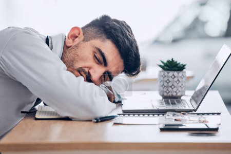 Photo for Man, doctor and sleeping on desk in burnout, overworked or stress from insomnia at the hospital. Exhausted male person, medical or healthcare employee resting or asleep on the office table at clinic. - Royalty Free Image