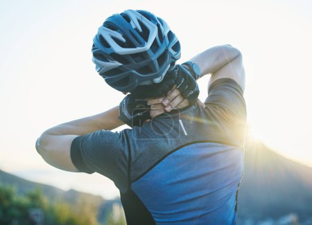 Photo for Man, cycling and neck pain with injury outdoor, stress and helmet for safety, fitness or exercise in sunshine. Cyclist, emergency and medical problem in countryside for workout, race or performance. - Royalty Free Image
