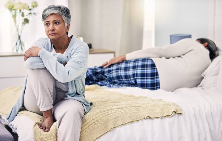 Photo for Senior woman, divorce and sad in bedroom with depression or frustrated in marriage with infidelity. Fight, anxiety and elderly woman with problem in home or bed with problem and stress or angry - Royalty Free Image