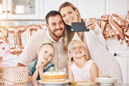 Photo for Celebrating happy birthday, party and a selfie as a family together at home. Loving parents and cheerful little kids smiling for joyful photo, bonding memories and special surprise celebration. - Royalty Free Image
