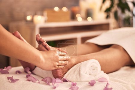 Photo for Reflexology, foot and hands massage at spa for acupressure treatment, zen wellness and circulation therapy. Closeup, feet and client at beauty salon for muscle detox, skincare and relax for pedicure. - Royalty Free Image