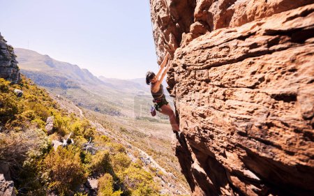Photo for Fitness, rock climbing and explore with woman on mountain for sports, adventure and challenge. Health, workout and hiking with person training on cliff for travel, freedom and exercise mockup. - Royalty Free Image