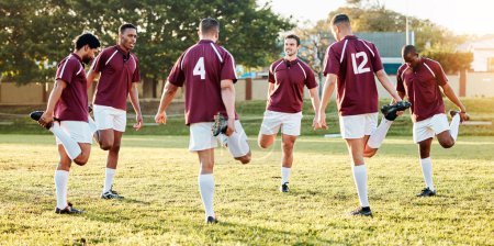 Photo for Rugby, sports and stretching with a team getting ready for training or a competitive game on a field. Fitness, sport and warm up with a man athlete group in preparation of a match outdoor in summer. - Royalty Free Image